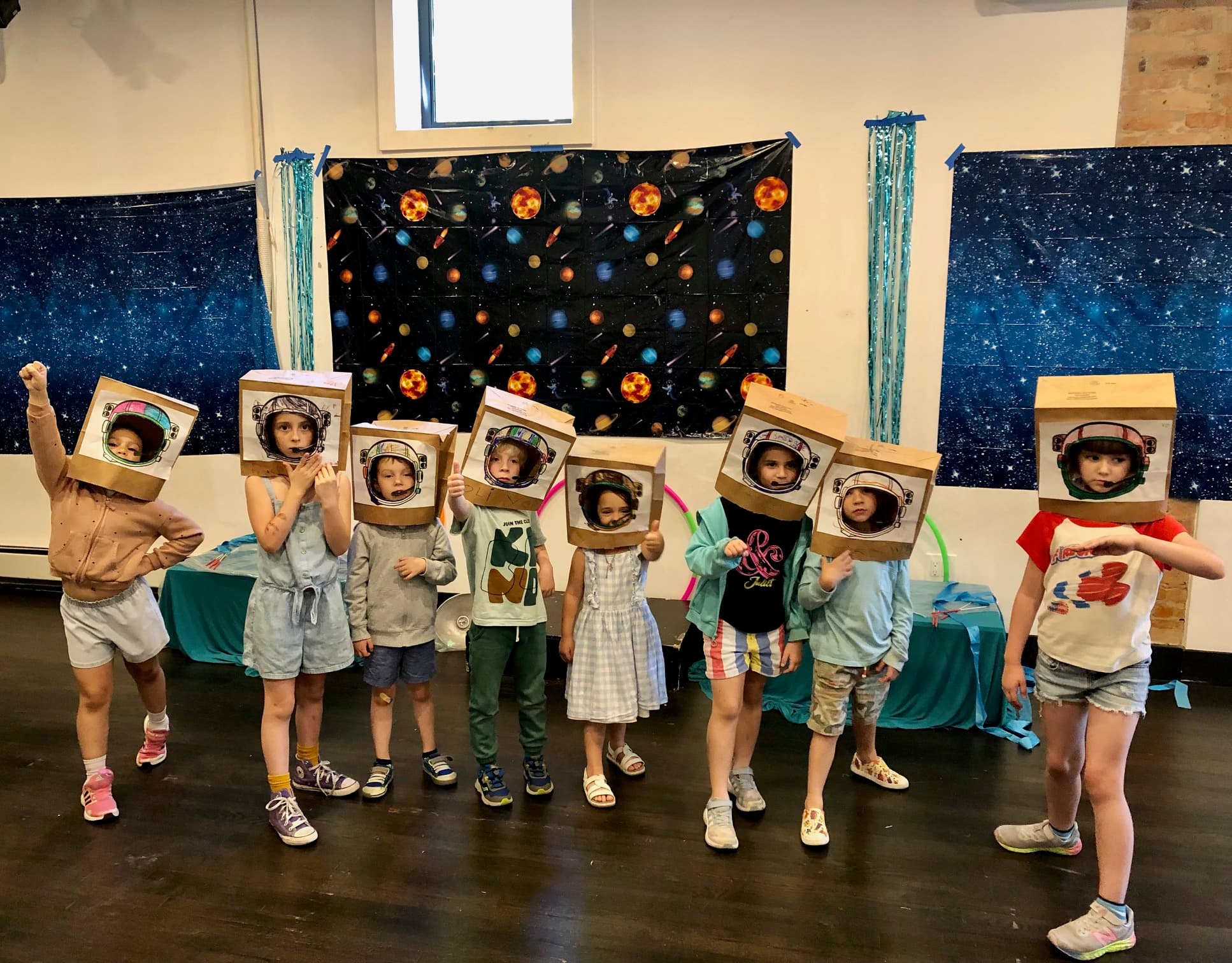 Students collaborating in an after-school theater program